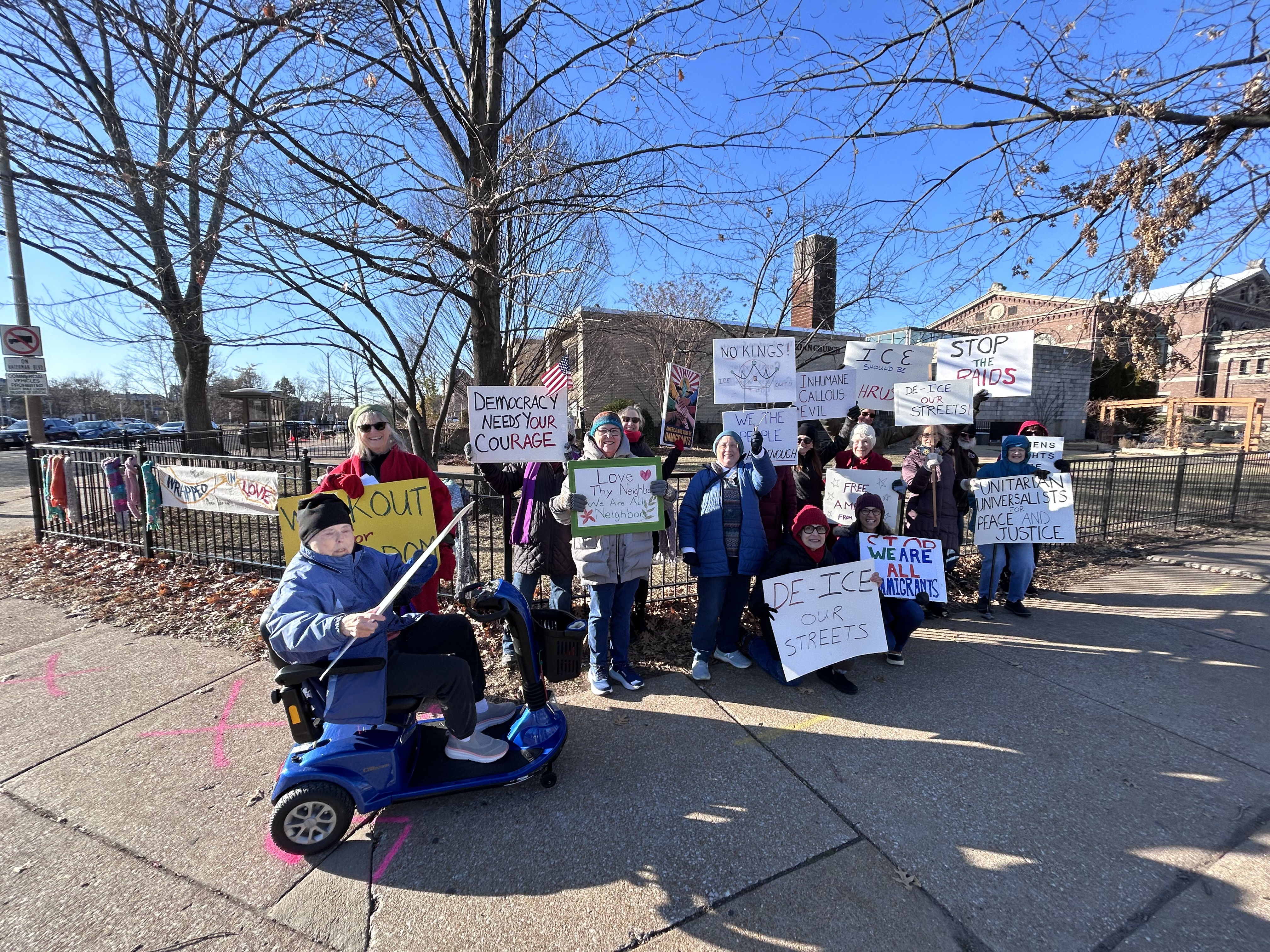 Members of First Unitarian at weekly human rights vigil